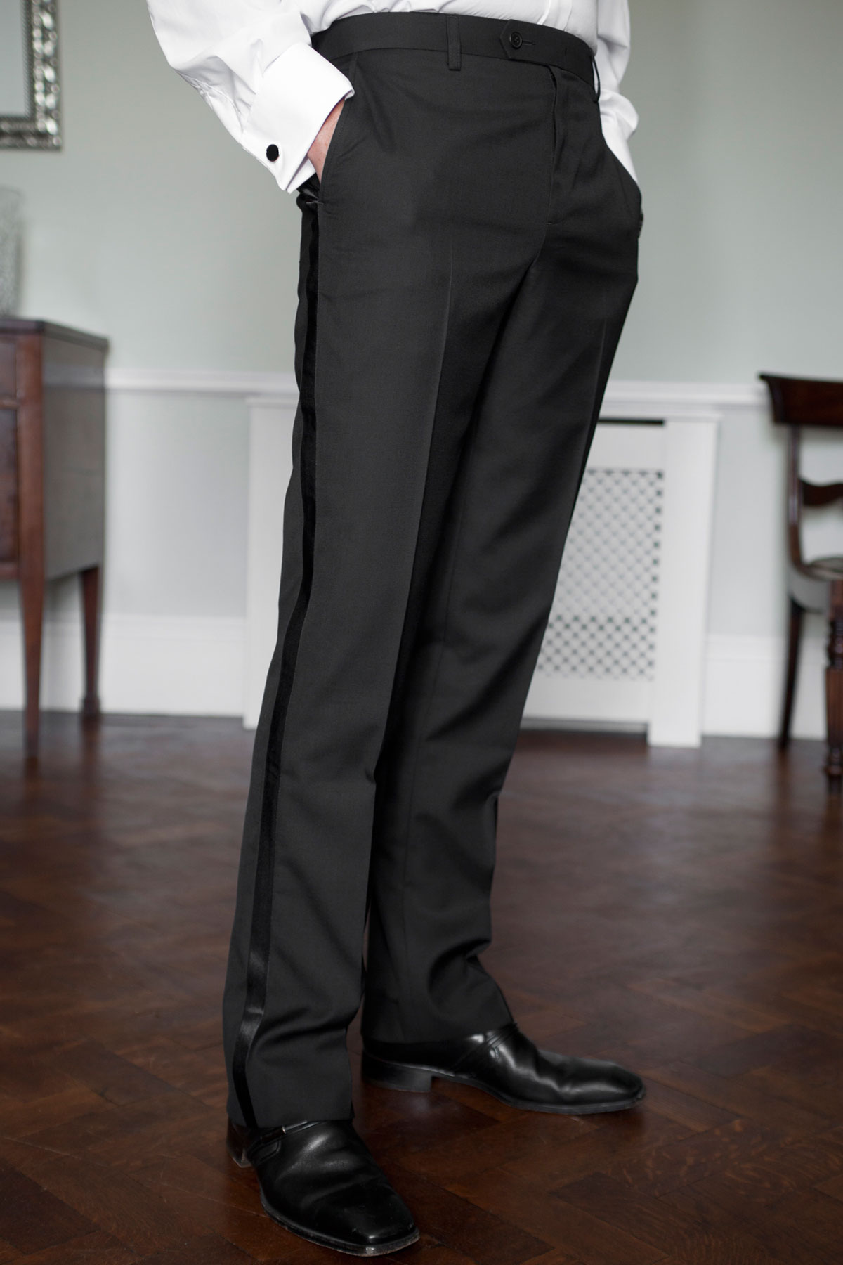 Shop by category Fulfil even the most exacting black-tie dress code with an essential piece from our men's evening wear range. Classic, monochrome suits and sharp tailoring are timeless and traditional, while offbeat accessories such as colourful bow ties and artistic cufflinks add an individual touch to your look.